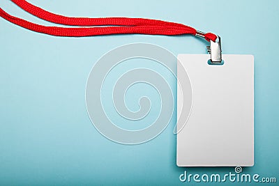 Plain empty name tag mockup hanging with string. Copy space Stock Photo