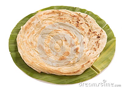 Plain paratha in a round shaped banana leaf isolated on white background Stock Photo