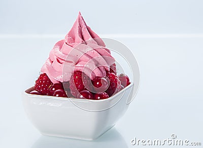 Plain Pink Frozen Yogurt on Fresh Berries Stock Photo