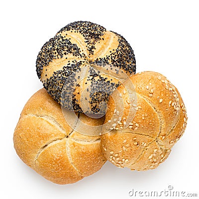 Plain, poppy seed amd sesame seed kaiser rolls isolated on white. Top view Stock Photo