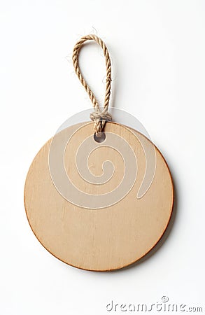 Plain round wooden tag with string loop on white. Blank circle plate for label design template. Charm pendant, craftwork project, Stock Photo