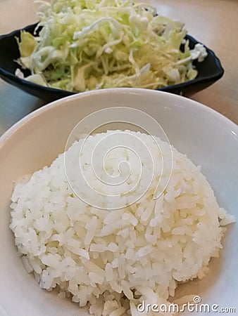 Plain steam rice bowl and Fresh slice cabbage, set meal, lunch set Stock Photo