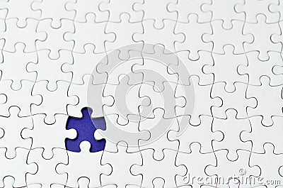 Plain white jigsaw puzzle. Stock Photo