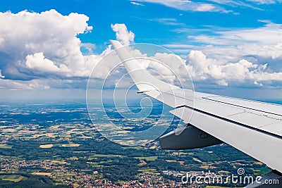 Plain wing over Belgium. Flight from Amsterdam to Brussels Stock Photo