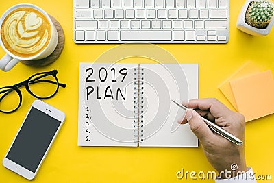 2019 plan,checklist text on notepad with businessman and office Stock Photo