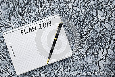 Plan for 2019, notepad and pen on a textured gray background Stock Photo