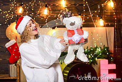 Plan for some interesting activity. Moms christmas routine. Woman teddy bear toy and gift christmas decorations Stock Photo