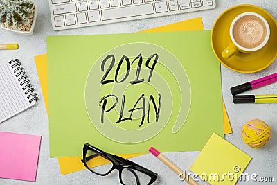 2019 plan text on colorful paper memo note with business office Stock Photo