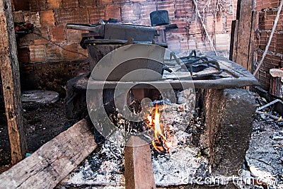 Planaltina, GoaÂ¡s, Brazil-June 27, 2018: Food Cooking on a makeshift stove Editorial Stock Photo