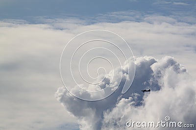 Plane in the Clouds Stock Photo
