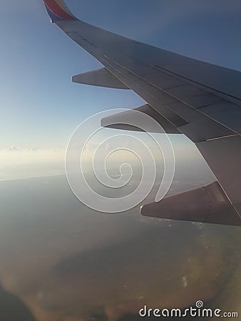 Plane clouds wing atmosphere sky Stock Photo