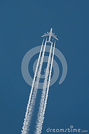 Plane at cruising altitude Stock Photo