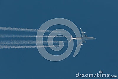 Plane at cruising altitude Stock Photo