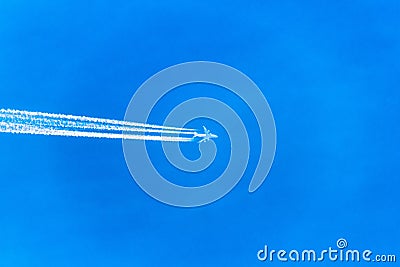 Plane at cruising altitude Stock Photo