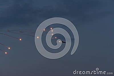 Plane dropping bombs Stock Photo