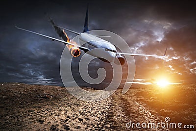 Plane with engine on fire about to crash Stock Photo