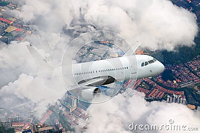 Plane flying sky. Airplane above city. White passenger aircraft climbs through the clouds. Stock Photo