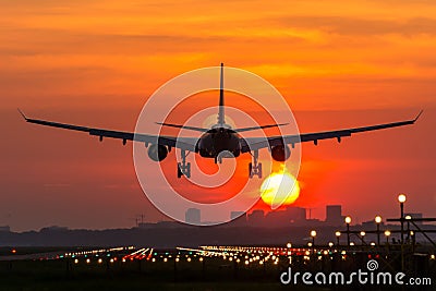 Plane is flying to the airport Stock Photo
