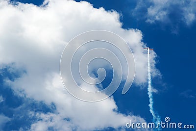 Plane flying up and smokes Stock Photo