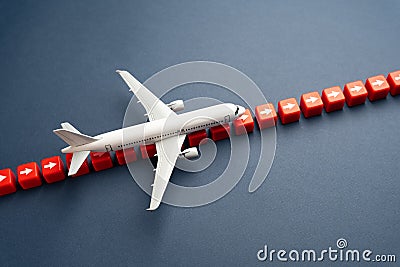 The plane follows the navigation route. The plane flies along a dotted route. Stock Photo