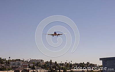 Plane Landing City Stock Photo