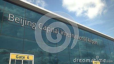 Commercial plane landing reflecting in the windows with Beijing Capital International Airport text. 3d rendering Editorial Stock Photo