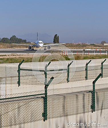 Plane seen from the front while maneuvering at the airport Stock Photo