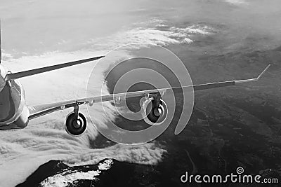 Plane in the sky flight travel transport airplane background black white Stock Photo