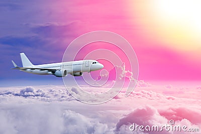 plane in the sky, Passenger commercial plane flying above the clouds ,concept of fast travel, vacation and business Stock Photo