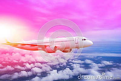 plane in the sky, Passenger commercial plane flying above the clouds ,concept of fast travel, vacation and business Stock Photo