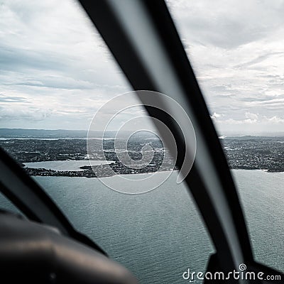 Plane view of a stunning lake and Reykjavik cost in Iceland under a cloudy sky Stock Photo
