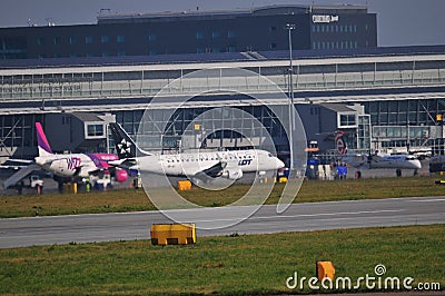 Planes on the Warsaw Chopin Airport Editorial Stock Photo