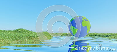 Planet earth over a lake with grass meadows Stock Photo