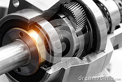 Planetary gear reducer, Engine gear wheels, industrial concept background Stock Photo