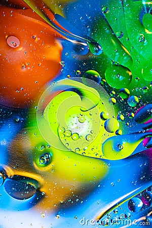 Mixing water and oil on a beautiful color abstract background gradient balls circles and ovals Stock Photo