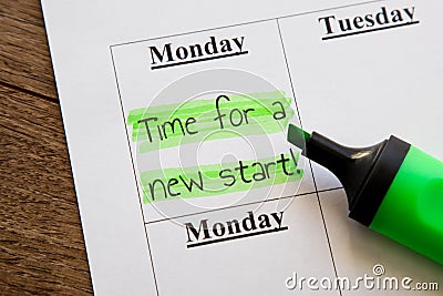planner calendar monday with highlighted inscription time for a new start Stock Photo