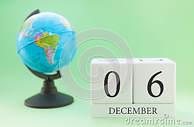 Planner wooden cube with numbers, 6 day of the month of December, winter Stock Photo