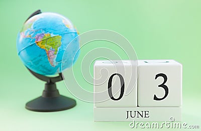 Planner wooden cube with numbers, 3 day of the month of June, summer Stock Photo