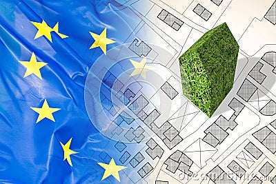 Planning green architecture in Europe - concept image with an imaginary city map against an European flag with a green building Stock Photo