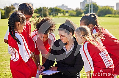 Planning, sports or coach with children for soccer strategy, training or health goals in Canada. team building, teamwork Stock Photo