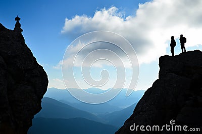 Silhouette climbers view summit Stock Photo