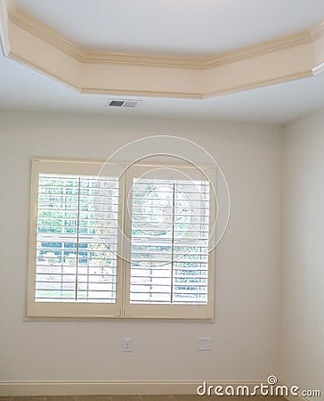 Plantation Shutters in New Bedroom Stock Photo