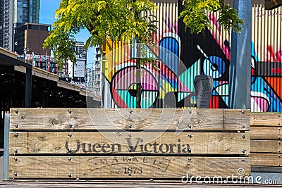 Planter boxes and colorful artwork at the Queen Victoria Markets Editorial Stock Photo