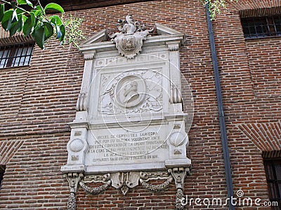 Plaque commemorating the burial of Cervantes on the facade of the Convent of the Barefoot Trinitarian, the place where his remain Editorial Stock Photo
