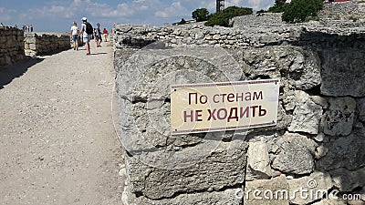 Plaque & Do not walk on walls Editorial Stock Photo