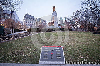 Plaque to Nathan Cirillo with remembrance poppies, victim of the 2014 terrorist shootings, on National War memorial Editorial Stock Photo