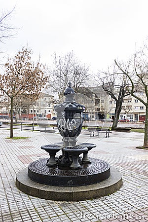 Old iron fountain with four pipes in the Coronation Park Editorial Stock Photo