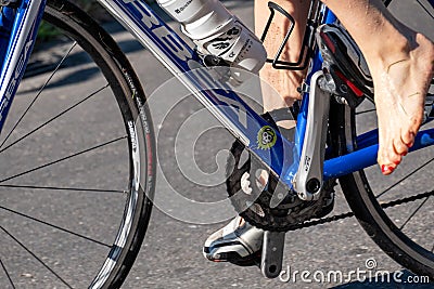 Fitness athletes pedaling their bikes during a national Triathlon, swimming, cycling and running events. Editorial Stock Photo