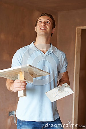 Plaster Working In Finished Room Stock Photo