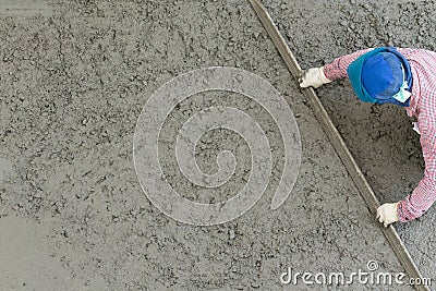 Plasterer concrete cement worker plastering flooring Stock Photo